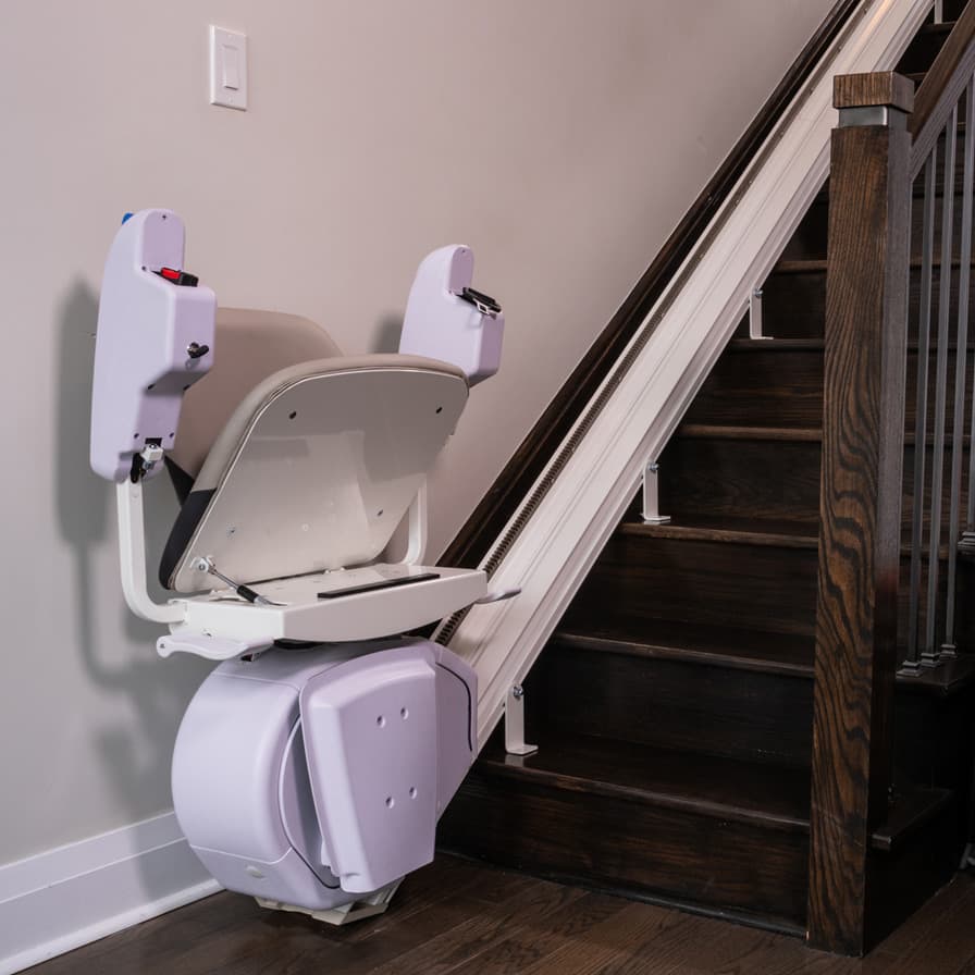 Savaria K2 Plus with Seat Folded Up at Bottom of Stairs
